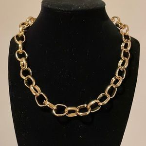 8inches golden color chain style necklace. Very good quality and build.Good gift